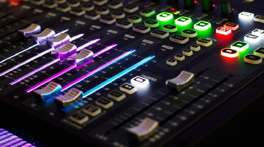 Audio mixing desk with faders